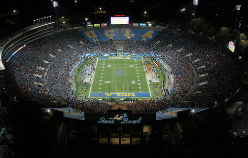 Rose Bowl at night filled with fans