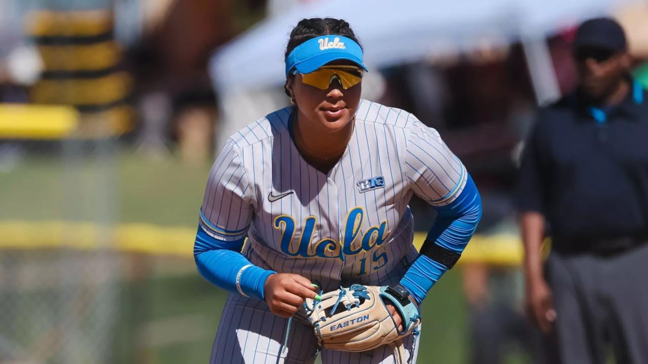 Softball player Jordan Woolery in uniform on the field