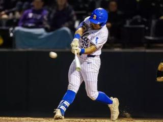 UCLA Baseball player swinging a bat